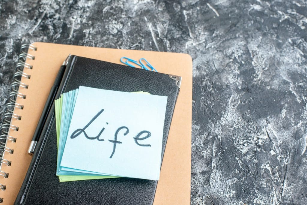 view-life-written-note-with-stickers-copybook-gray-surface-team-color-job-photo-business-office-work-school-college-notepad